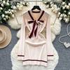 Xiaoxiangfeng advanced sense contrasting color bow strap long-sleeved dress women's metal buckle waist thin knitted skirt