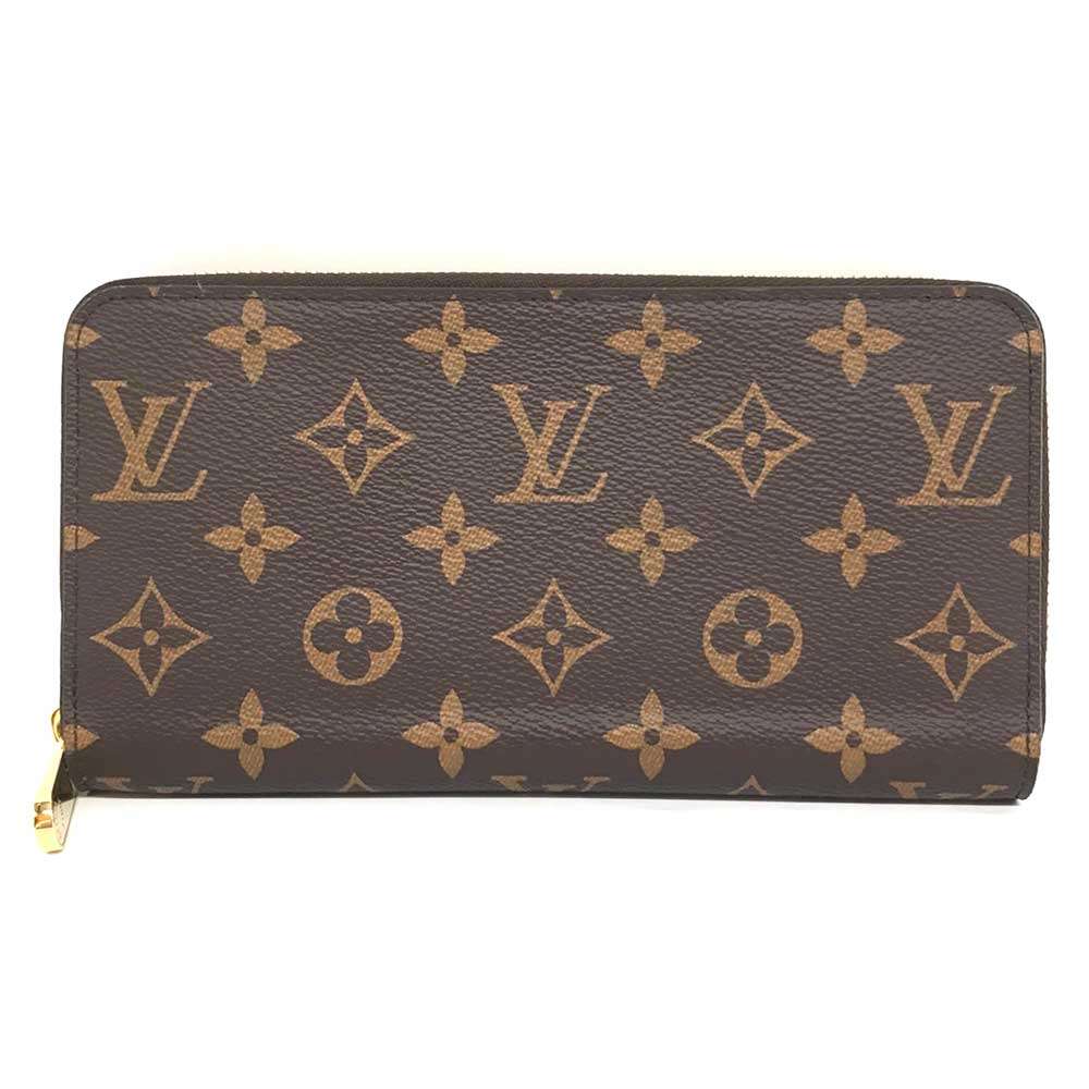 

Вжитий гаманець LOUIS VUITTON, полотно Monogram, унісекс