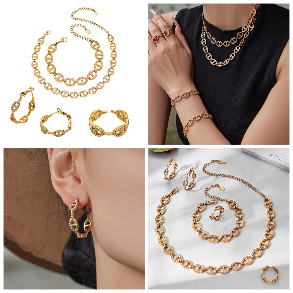 European & American Fashion 18K Gold-Plated Jewelry Set: Ultra-Sparkling Diamond Design with Necklace, Bracelet, and Earrings.