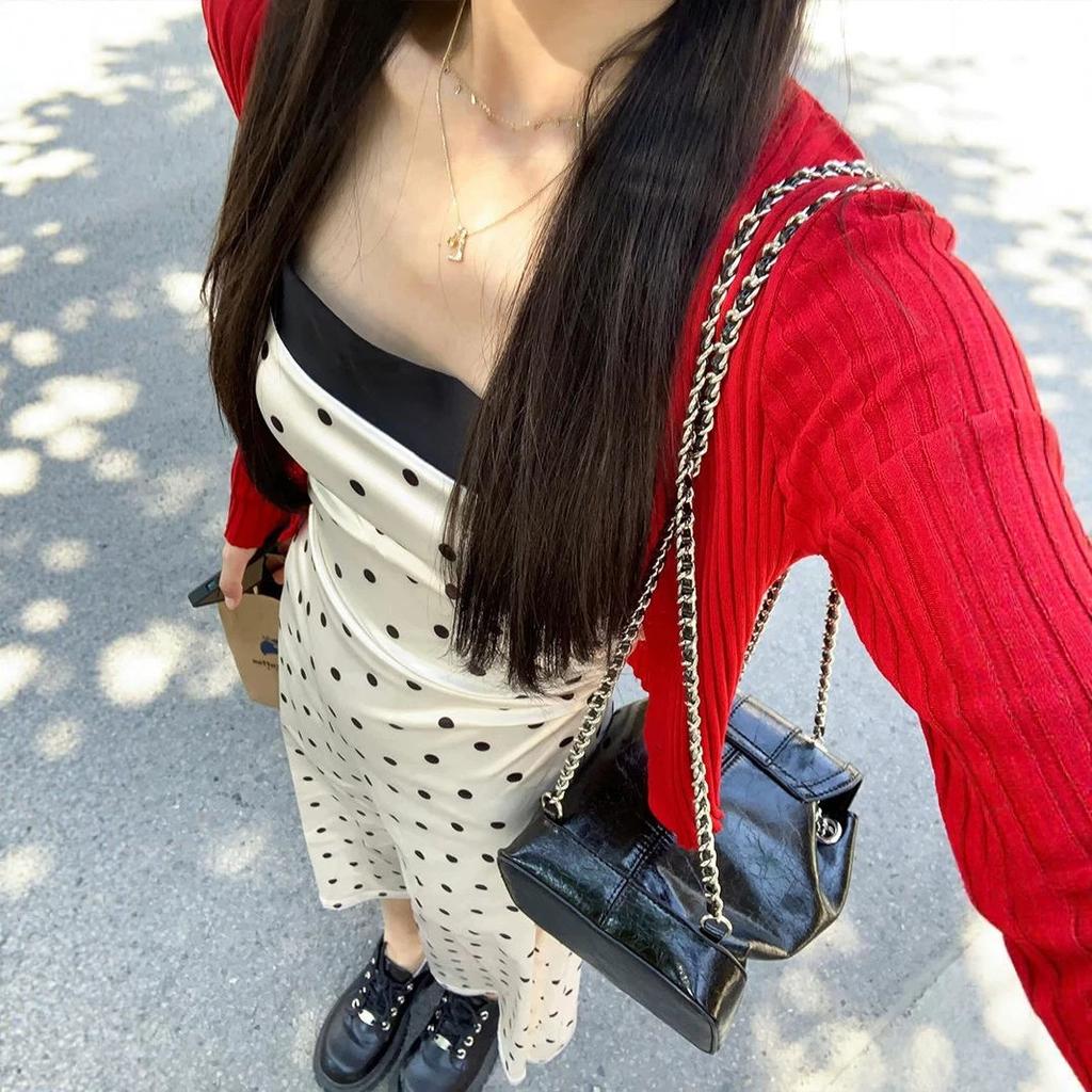 Pure desire style temperament polka dot suspender dress women's summer new design sense splicing waist showing thin long skirt tide