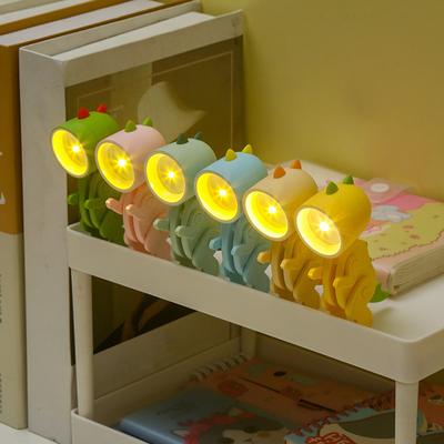 Lampa dinozaura z kreskówek Elastyczne kończyny z wyglądem Urocza migocząca, miniaturowa ochrona oczu w nocy