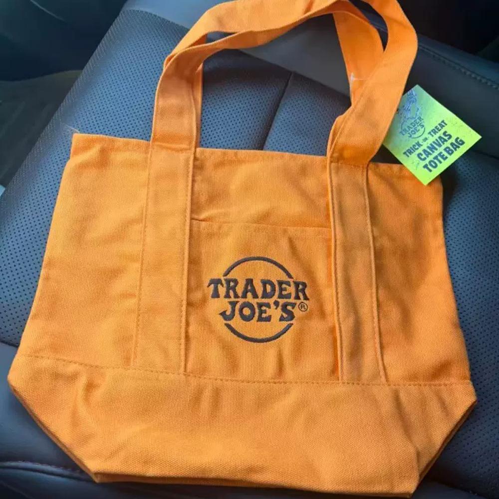 Official Trader Joe's Trick or Treat Tote Bag - Halloween Canvas Shopping Bag with Side Pocket for Groceries Pumpkin Patch
