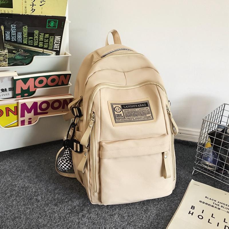 Backpack female new college student simple travel computer backpack high school junior high school student large capacity schoolbag male