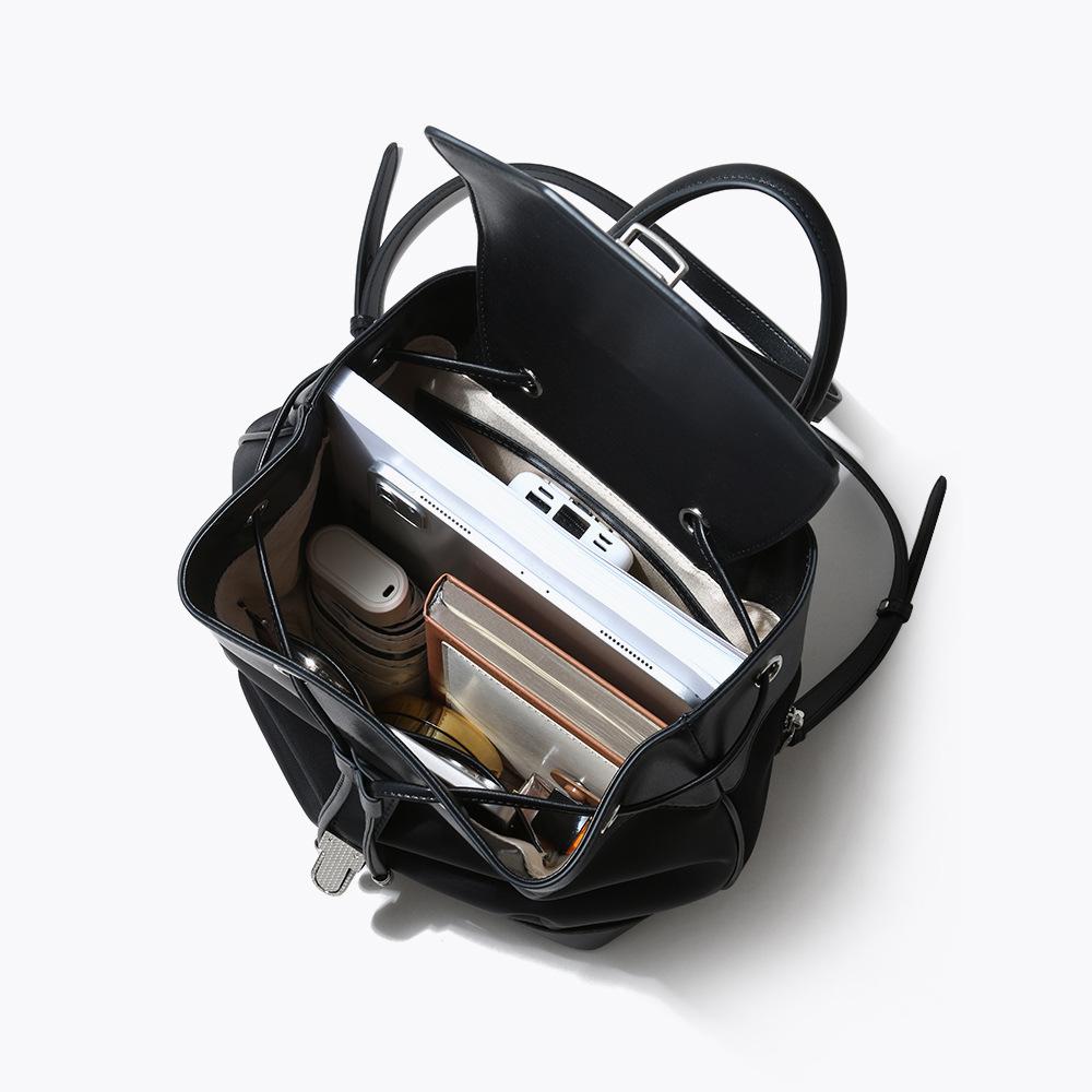 New niche casual backpack large capacity high-end leather with cloth simple commuter backpack female lock computer bag