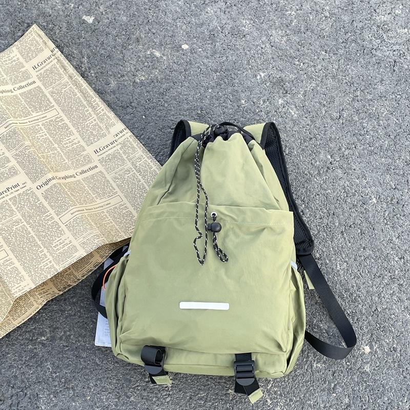 

Korean version ins new Korean version rawr backpack travel mountain climbing cycling backpack badminton bag men s and women s tennis bag