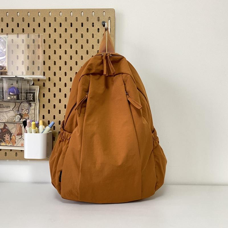 Travel lightweight advanced sense niche backpack college student commuter junior high school girls schoolbag Japanese and Korean simple backpack