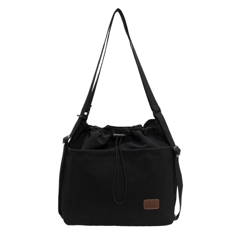 2025 new large-capacity casual fashion drawstring pleated shoulder bag travel leisure messenger tote bag women