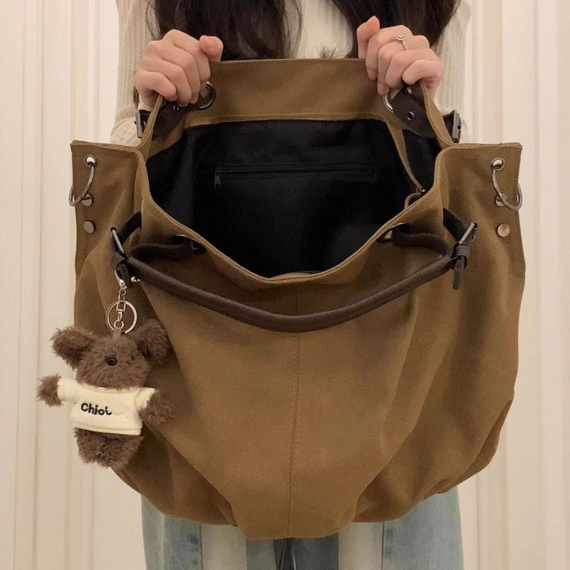 Tote Bag with Large Capacity and Multiple Pockets, for Commuting, with A Single Shoulder Strap and A Slanted Design.