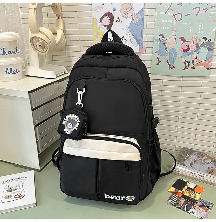 

The schoolbag is simple and contrasting colors. The campus backpack for middle and high school students is sweet and high-value чорний