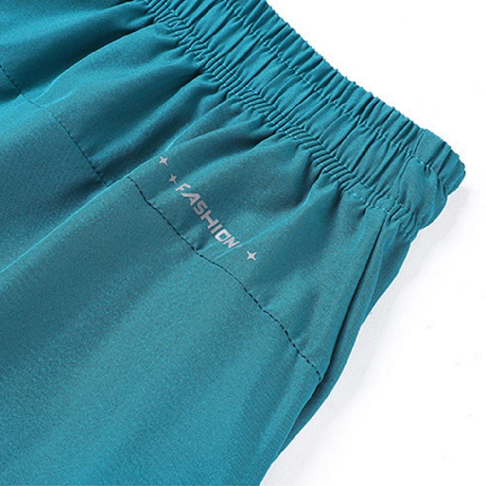 Nuovi Pantaloncini Casual Sportivi Estivi da Uomo Alta Qualità Seta di Ghiaccio Leggeri Asciugatura Rapida Corsa Fitness Larghi Pantaloncini 3/4