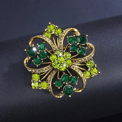 Elegantní zelená květinová brož k oblekům a večerním šatům