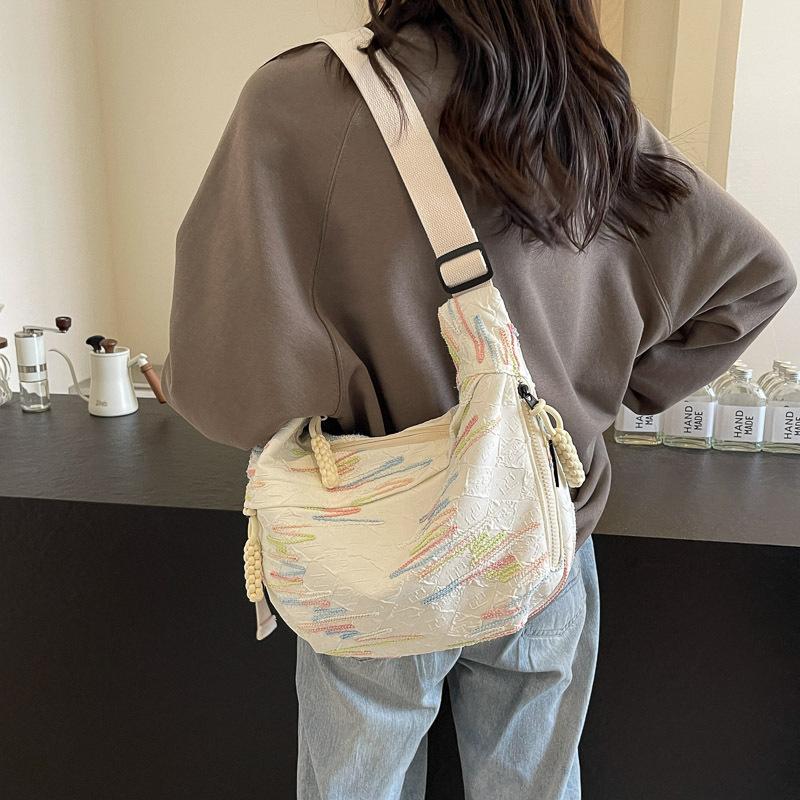 Canvas bag women's large capacity 2025 new summer fashion niche design shoulder messenger bag cloth bag dumpling bag