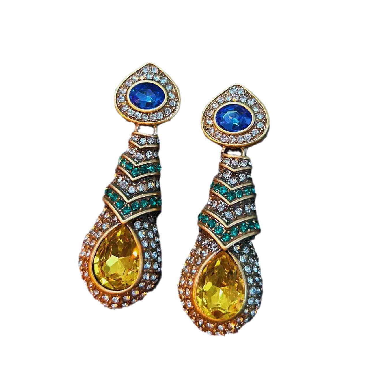 

Vintage Rhinestone Crystal Stud Earrings with Real Gold Embossed Design