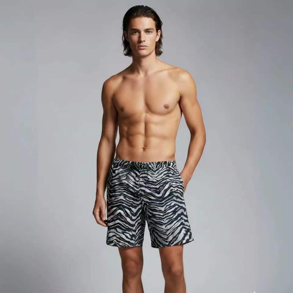 

2026 Men s Light-Filtering Smart Swimsuit: Breathable, Opaque, Loose-Fit Printed Beach Shorts L