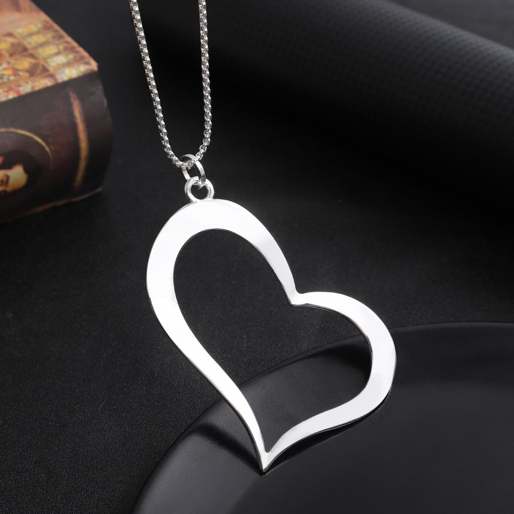 Hollow geometric flower love long necklace, women's exaggerated high-end irregular brushed pendant