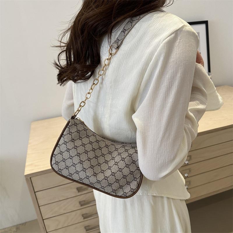 Casual chain shoulder bag simple portable new retro personalized bag women's small fresh texture armpit bag
