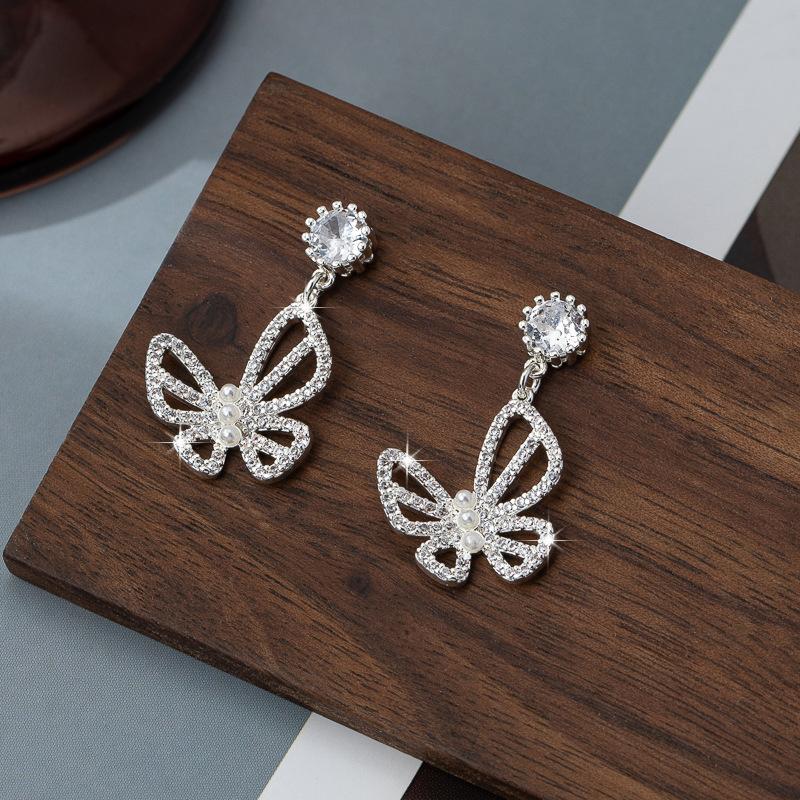 Pearl butterfly earrings women's zircon hollow high-end light luxury earrings exquisite and sweet personality fashion temperament earrings
