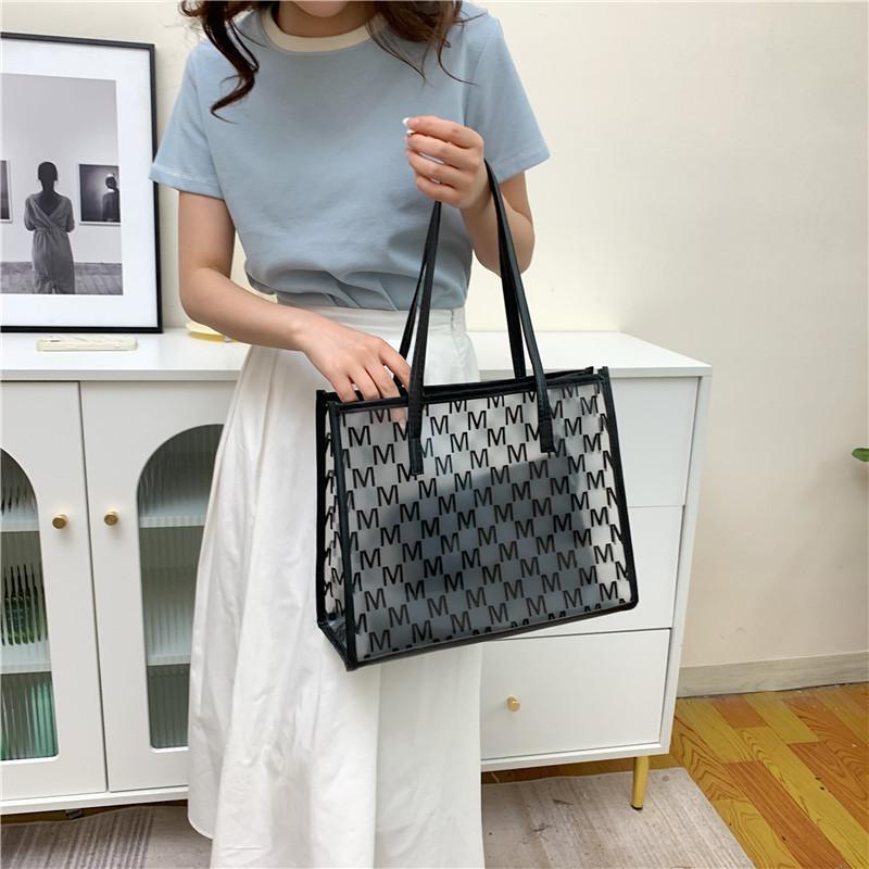 Pvc Bag For Women With Large Capacity And Letter M Print Design For Daily Use