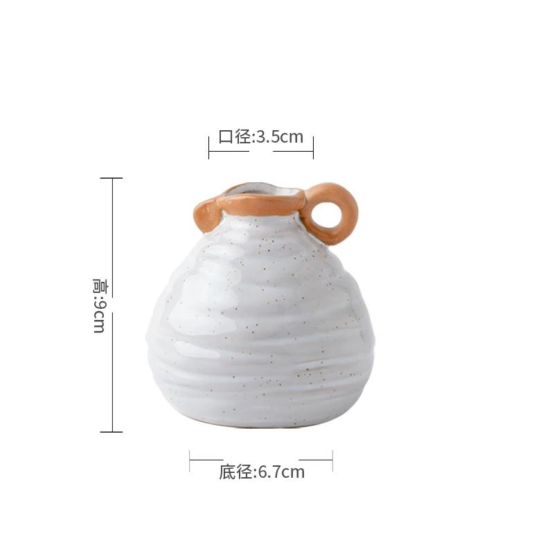 

Ваза для цветов в стиле ретро с рельефом, легкая, для роскошного отеля, белая керамическая ваза для гостиной, настольная ваза для цветочной композиции, банка для хранения украшений