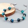 Boho Handgewebtes Damenarmband mit tiefblauen und bunten Tigeraugensteinen
