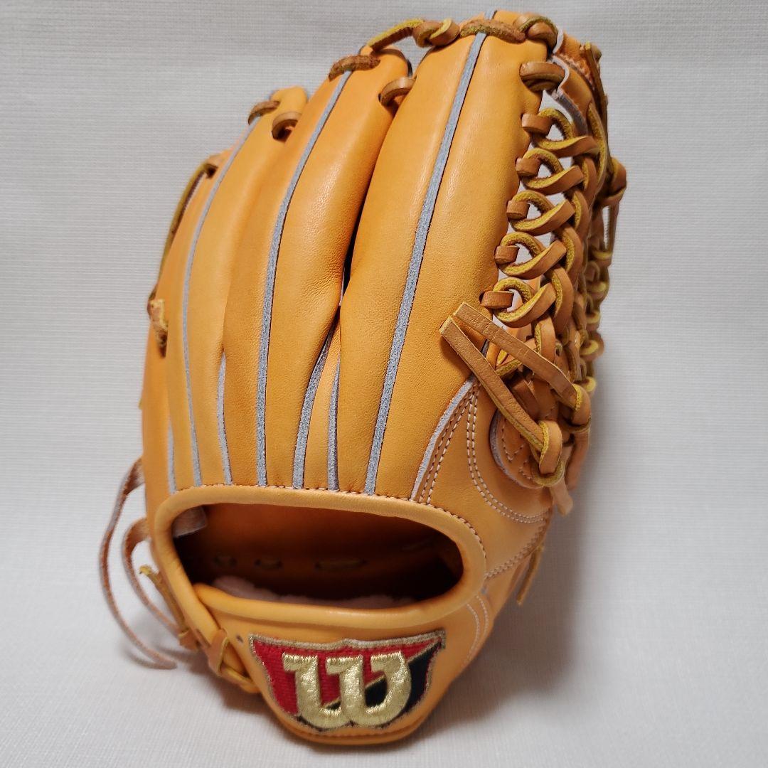Used Wilson hard glove for infielders, right-handed pitchers, made in Japan [with discoloration]
