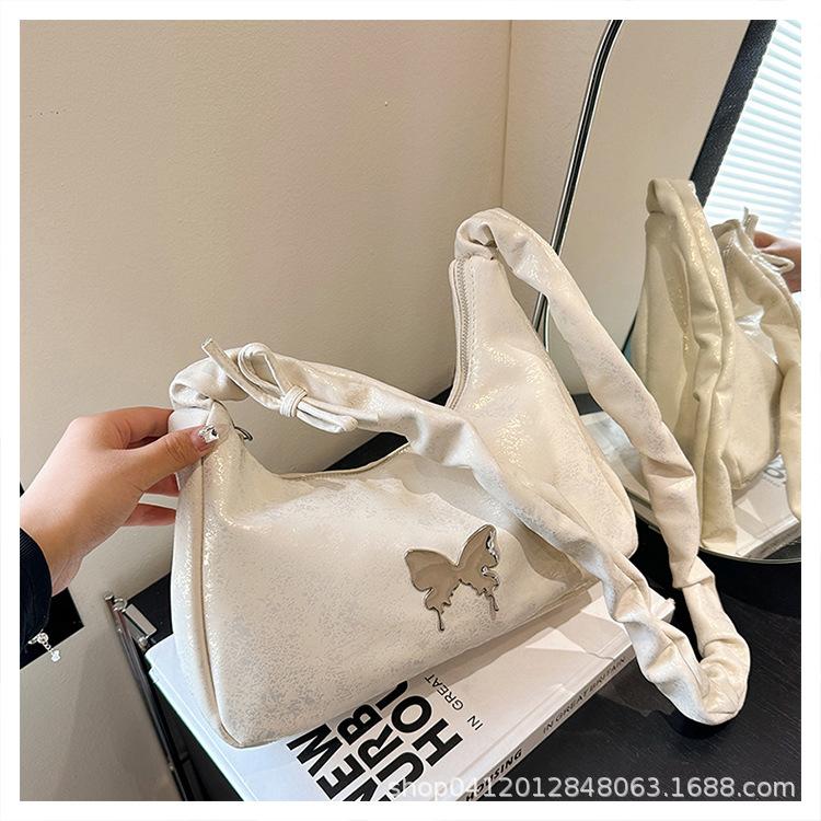 

Korean version ins pleated armpit bag 2025 new design sense niche messenger bag super fire butterfly commuter shoulder bag