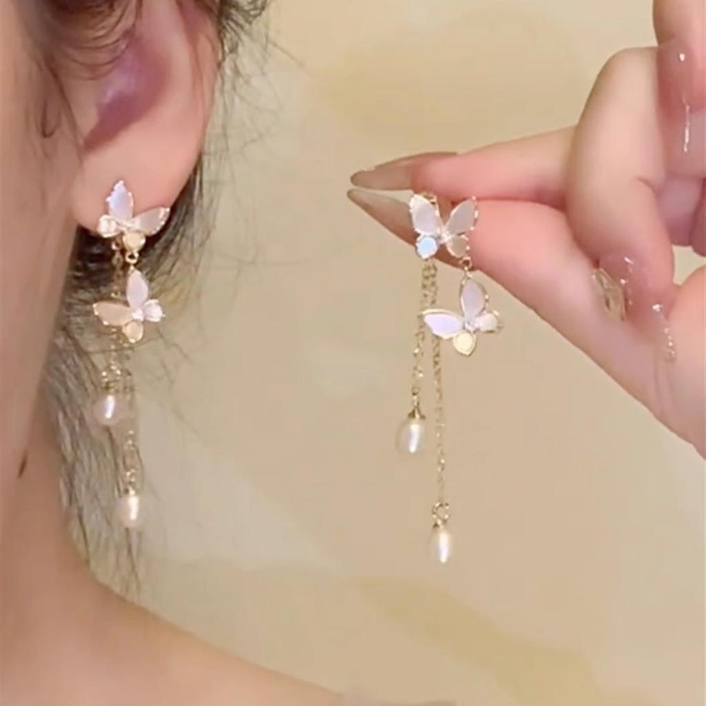 Spring and summer new pearl butterfly earrings female super fairy temperament tassel long stud earrings fairy ears