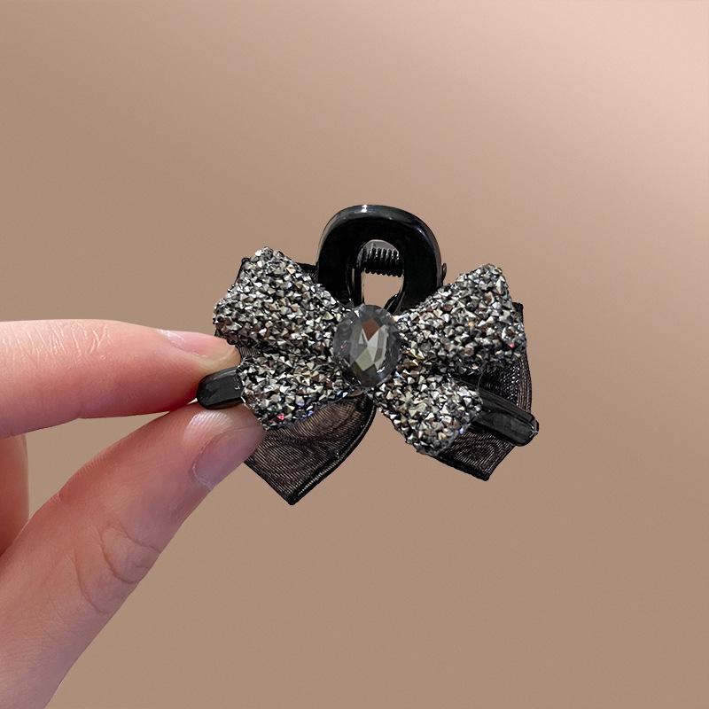 

Элегантная высококачественная заколка для волос с бриллиантовым бантом F1348 чёрный