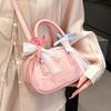 Frühling 2025 neu Ou Ruofeng Koreanische Version von einfacher tragbarer Boston-Tasche Nische lässig vielseitige Umhängetasche Tasche Damen