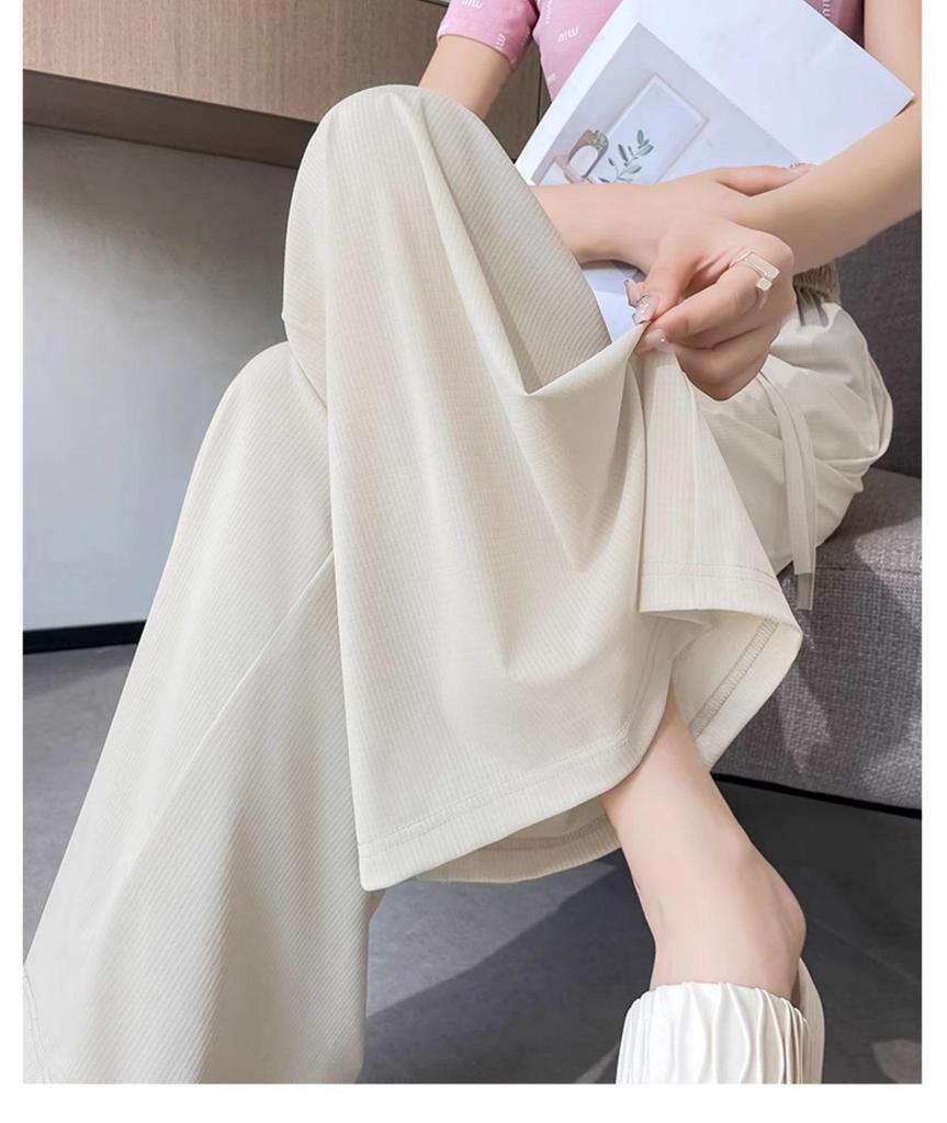 High-Waisted Ice Silk Women's Culottes - Lightweight, Wide-Leg, and Slimming Nine-Point Pants for Summer.