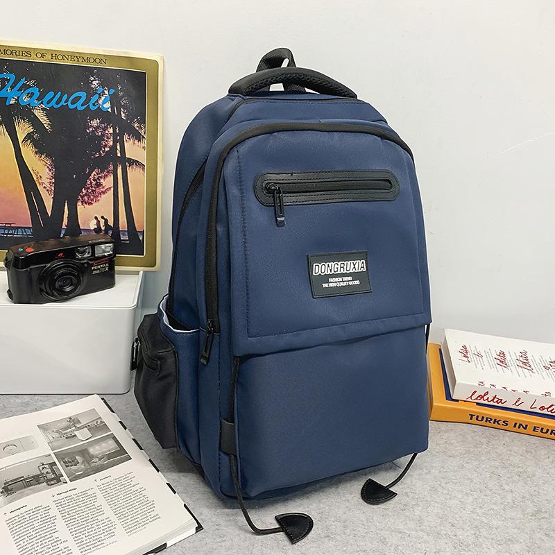 Backpack New large-capacity backpack Junior high school schoolbag College student backpack High value couple student schoolbag