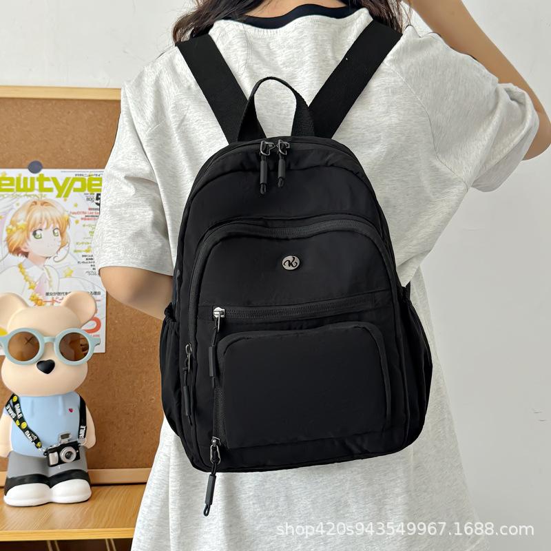 Schoolbag spot wholesale simple fashion backpack high sense niche women outdoor travel commuter small bag