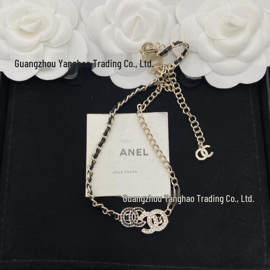 Seiko High-Quality Double C Inlaid Black & White Diamond Necklace with Black Leather Cord