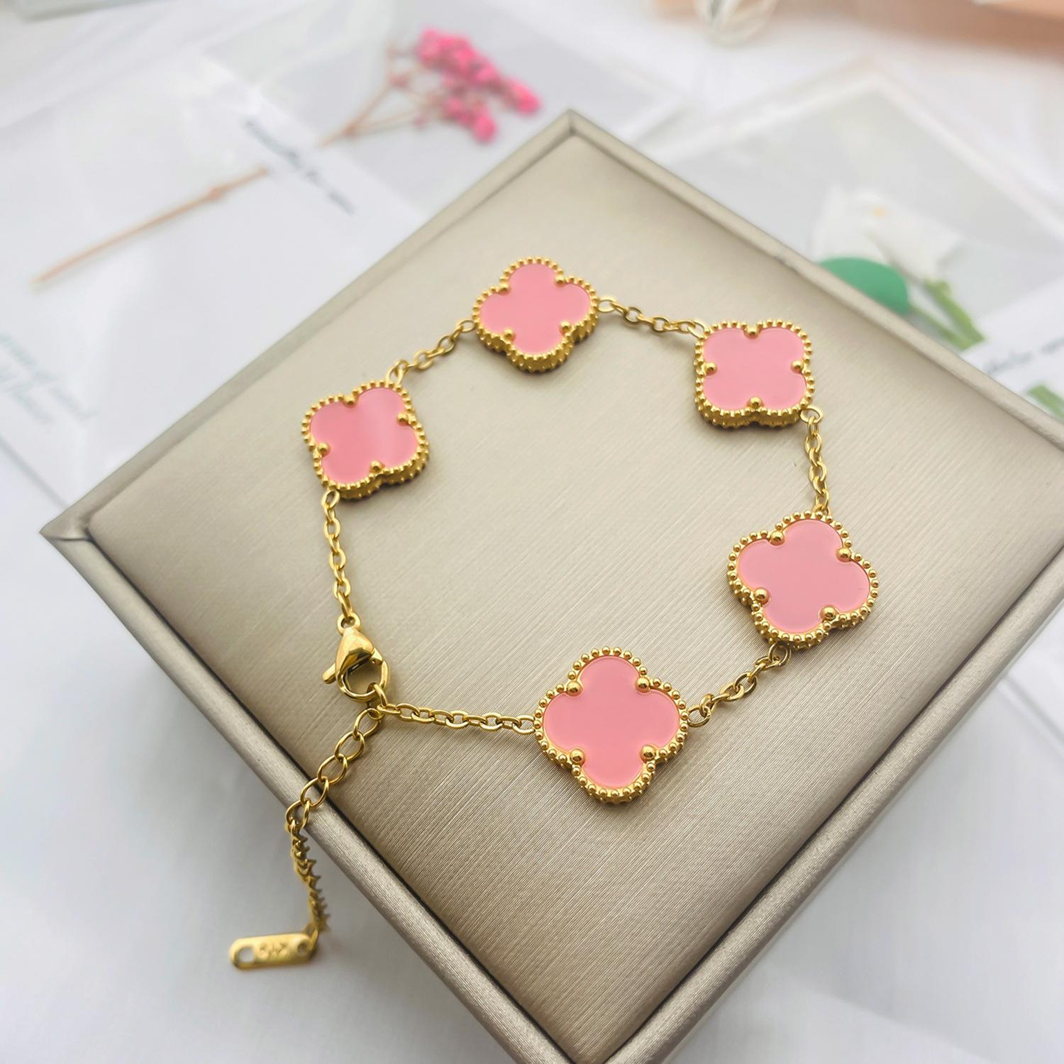 

Жіночий браслет із чотирма листами конюшини та V-золотий набір із двостороннього мушляшного намиста — не тьмяніє, модний дизайн