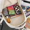Schoolbag high-value simple casual couple travel backpack large capacity junior high school students multi-compartment backpack men
