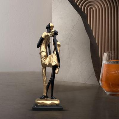 Stylish Golden Black Resin Romantic Couple Statue for Home Decor (Pack of 1, Black & Golden)