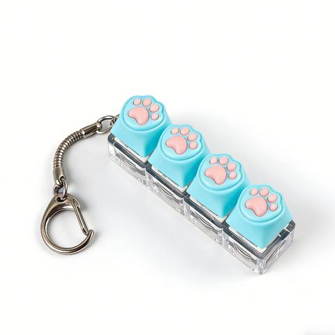 Tragbar Silikon Katzenpfote Clicker Schlüsselanhänger LED-Licht Leuchtend Fidget Spielzeug Tastaturstil Taste Stress Angst Linderung Geschenk