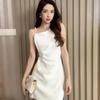 Foreign style solid color new pearl suspender dress women's summer French temperament slim and thin fashion short skirt