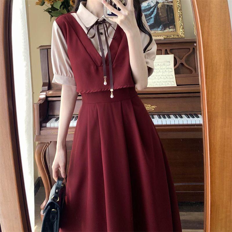 Hepburn College style new splicing fake two-piece short-sleeved dress women's Korean version waist and thin French dress