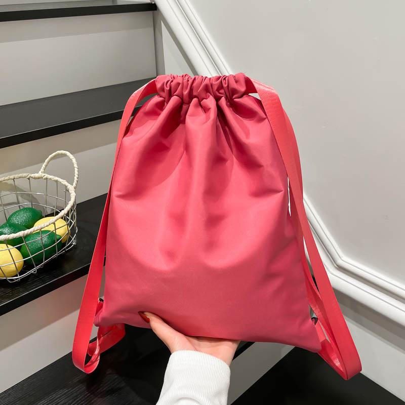 Schoolbag solid color Korean version drawstring retro versatile large capacity backpack female niche simple fashion personalized backpack