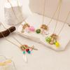 18K Gold Plated Multi-Pendant Necklace with Cross, Mushroom, Heart, Star, Pearl & Starfish on Titanium Steel