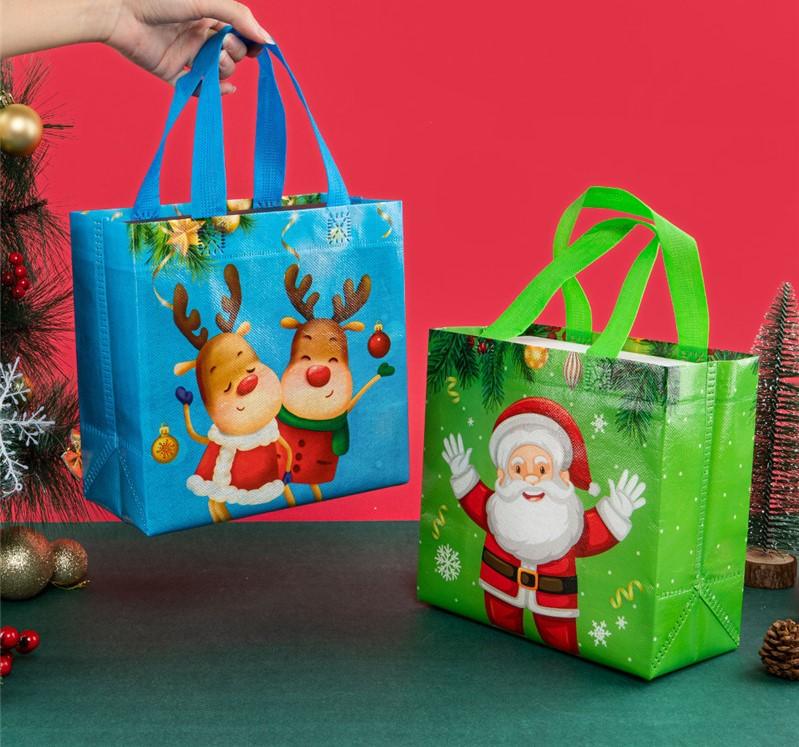 StoBag, Froh und Hell, Weihnachtliche Vliestaschen, Weihnachtsmann, Rentier, Schneeflocke, Verpackung für Geschenk, Wiederverwendbar, 12/30 Stück