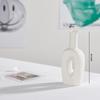 White Ceramic Vase with Dried Baby's Breath for Living Room or Dining Table Decoration