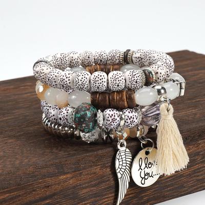 Bohemian Multi-Layer Bracelet Set: Tassel, Wing, and Imitation Bodhi Beads Elastic Style