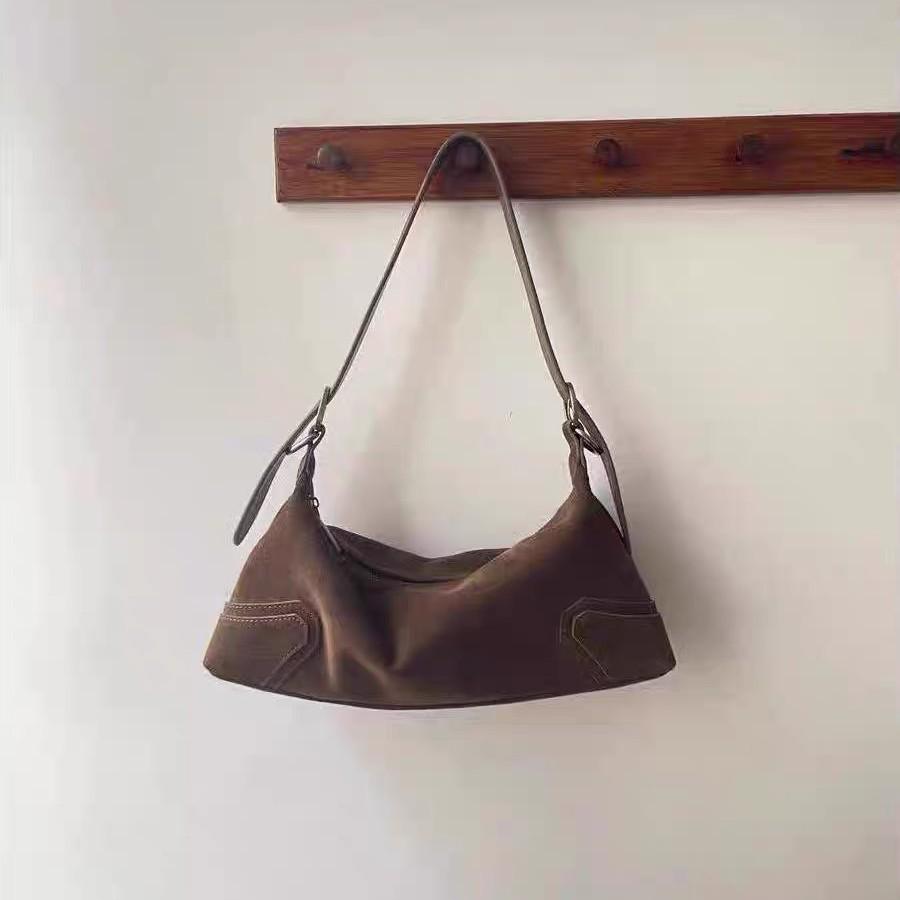 

Американская ретро бархатная кожаная мотоциклетная сумка коричневый