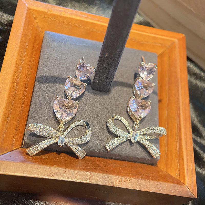 

Модные серьги-бантики в форме персикового сердца Han Fan Популярные ювелирные серьги-гвоздики Цветной циркон Yiwu