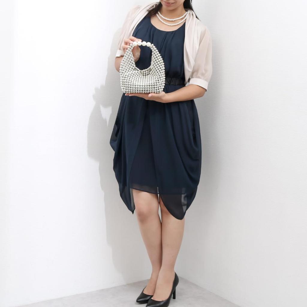 Silberne Perlen-Tragetasche