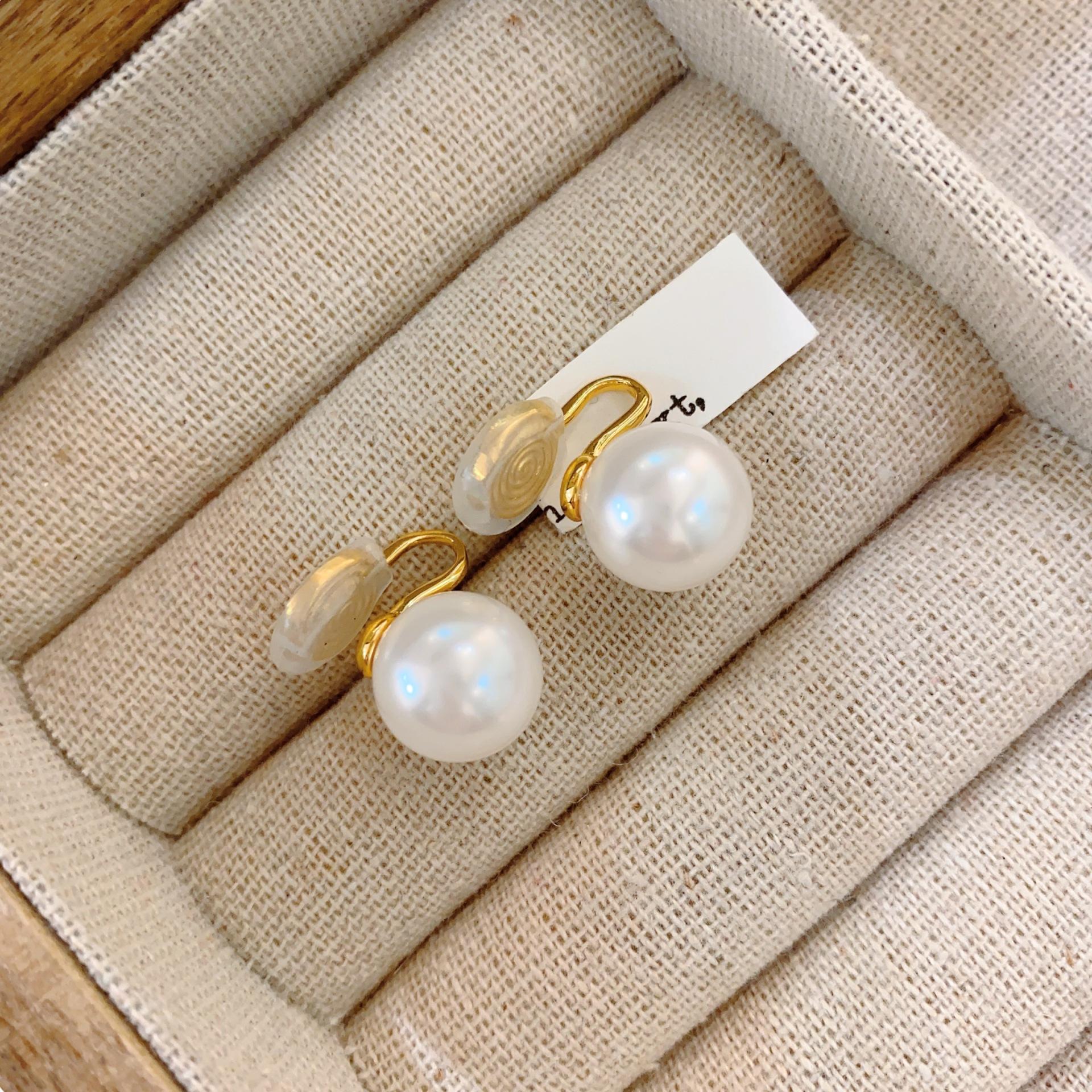 

Shi Jiaping for pearl ear clips without ear piercings, design sense, advanced mosquito coil disc, ear bone clip, earrings, studs.