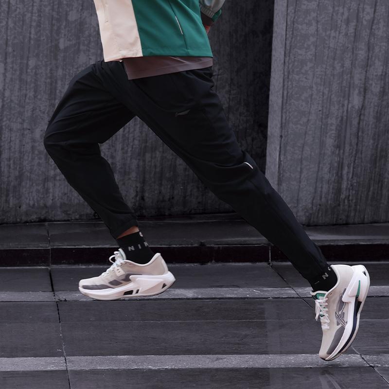 Li Ning Running Series Solid Color Sports Lace-Up Mid-Waist Comfortable Breathable Casual Pants Men bottoms Black AYKU173-1