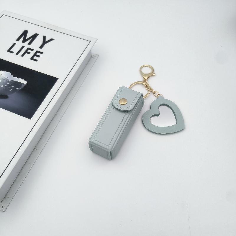 

Модна Сумка-Помада зі Шкіри PU Портативна Міні-Сумка для Блиску Губ на Відкритому Повітрі Багатофункціональна З Дзеркалом Тримач для Помади Жіноча світло-синій колір